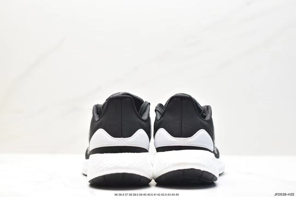 Tenis Pureboost Negro Blanco.