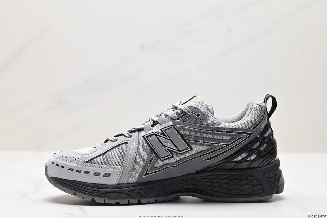 Tenis New Balance 1906 Gris Negro.