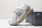 Tenis New Balance 1906 Blanco Gris.