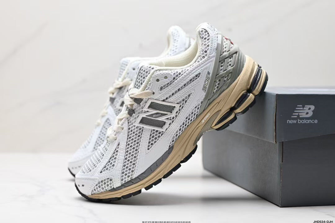 Tenis New Balance 1906 Blanco Gris.
