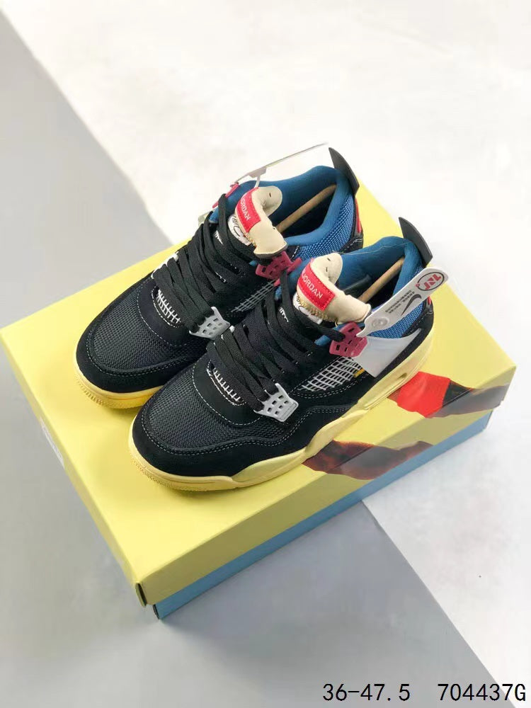 Tenis Jordan 4 Retro Negro Azul.