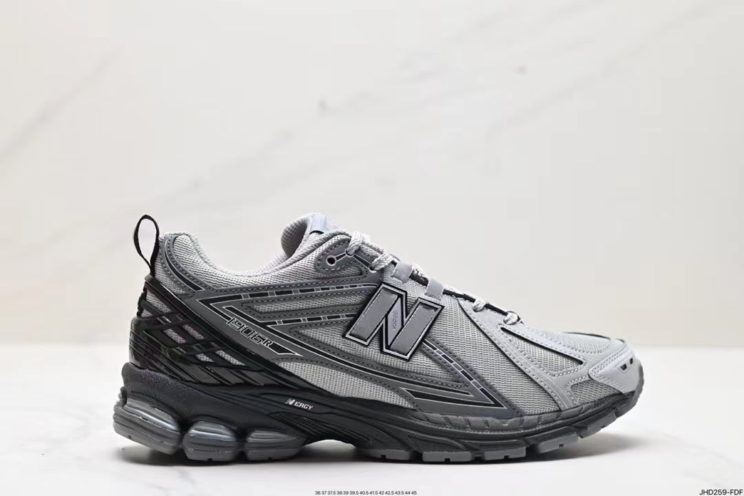Tenis New Balance 1906 Gris Negro.
