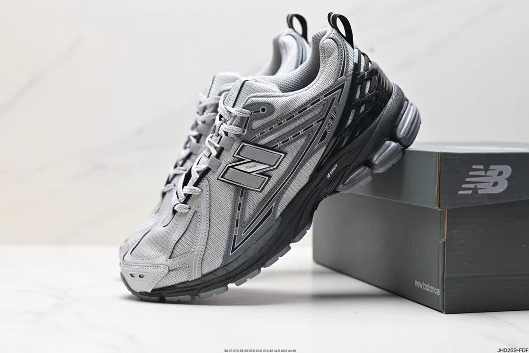 Tenis New Balance 1906 Gris Negro.