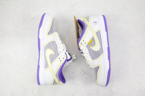 Tenis Union LA x Dunk Low Blanco Morado.