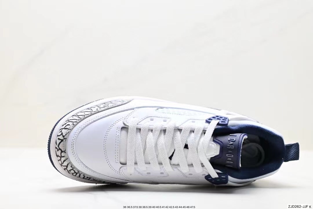 Tenis Jordan Spizike Low Blanco Azul Oscuro.