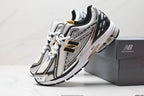Tenis New Balance 1906 Negro Gris.