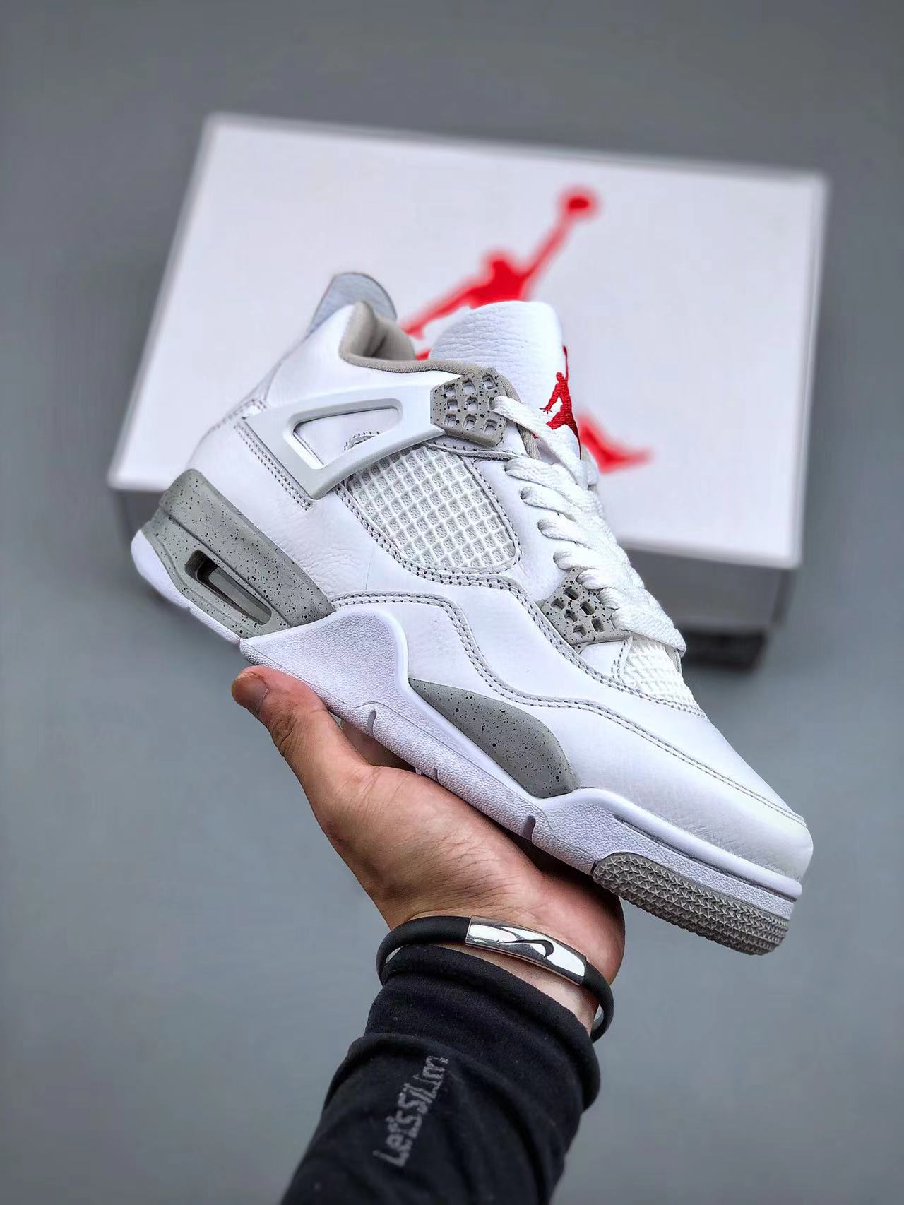 Tenis Jordan 4 Retro Blanco Gris.