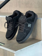 Tenis DC Negros.
