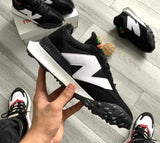 Tenis New Balance XC Negro.