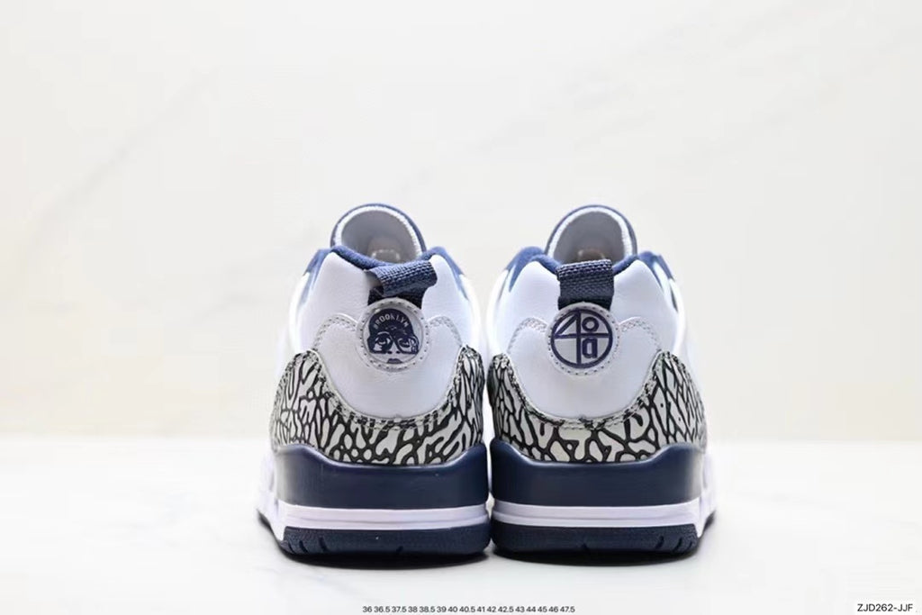 Tenis Jordan Spizike Low Blanco Azul Oscuro.