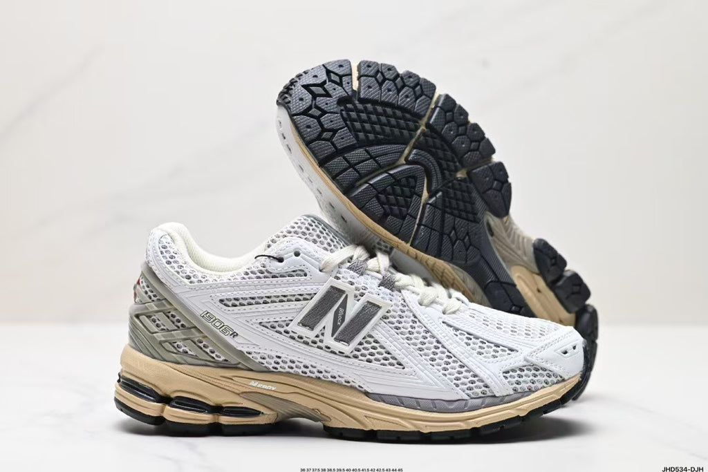 Tenis New Balance 1906 Blanco Gris.