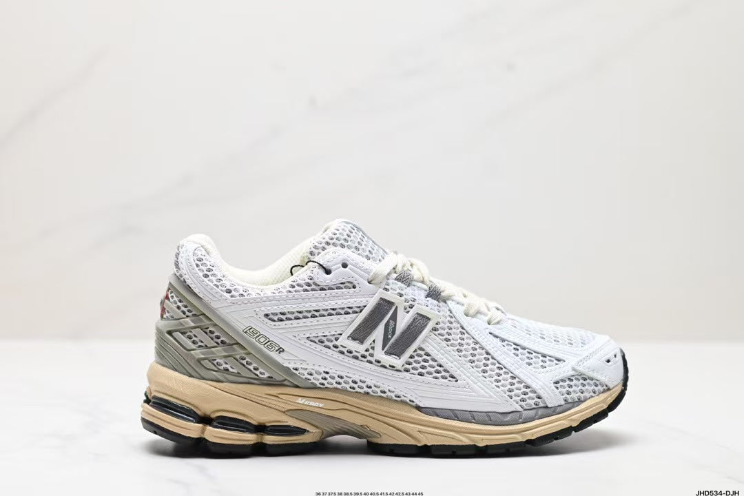 Tenis New Balance 1906 Blanco Gris.