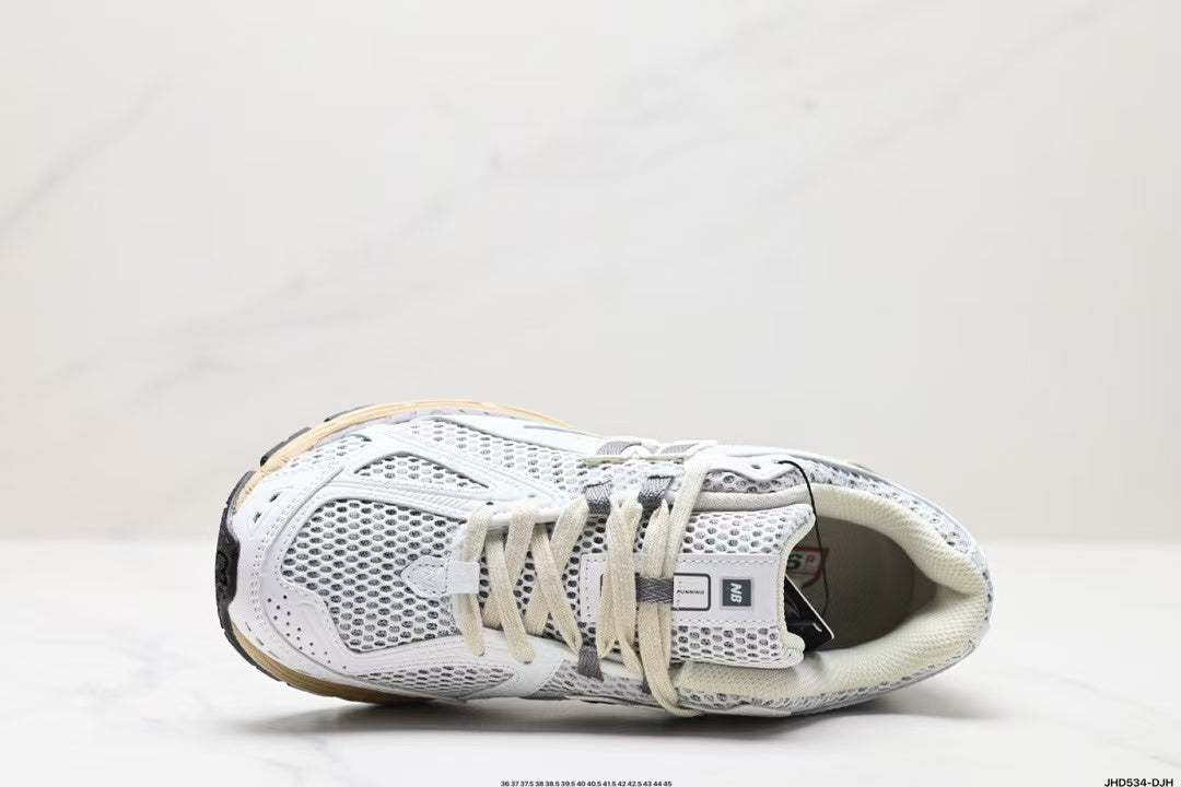 Tenis New Balance 1906 Blanco Gris.