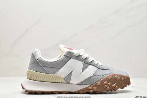 Tenis New Balance XC Gris Blanco.