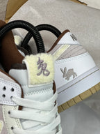 Tenis SB dink Low Blanco Rosa Claro.