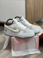 Tenis SB dink Low Blanco Rosa Claro.