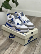 Tenis Jordan 4 Retro Blanco Azul.